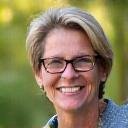 A serene coaching session helping a professional find focus